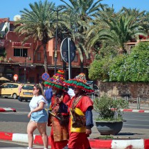 Two water sellers in their ancient traditional clothing